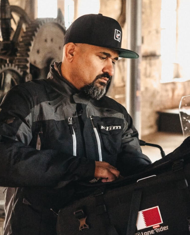 Khalid Al Jaber Global Explorer &amp; Strategic Adventurer. Turned his Motorcycle into his office.